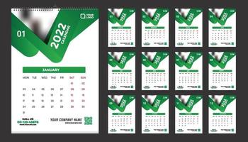 Diseño de plantilla de calendario de pared mensual para 2022, año. la semana comienza el domingo. diario del planificador con lugar para la foto. vector