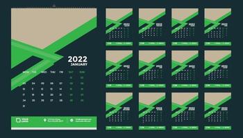 Diseño de plantilla de calendario de pared mensual para 2022, año. la semana comienza el domingo. diario del planificador con lugar para la foto. vector