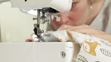 A Seamstress Sewing on A Machine video