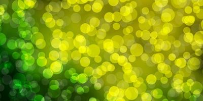 Light Green, Yellow vector layout with circle shapes. Illustration with set of shining colorful abstract spheres. Pattern for booklets, leaflets.