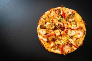 Seafood of shrimp, octopus, mussel and crab pizza on wood tray photo