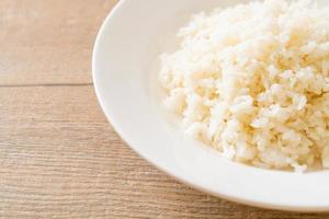 Cooked Thai jasmine white rice on plate photo