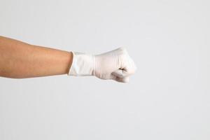 mano con guantes médicos foto