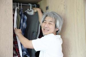 Asian Man with Wardrobe photo