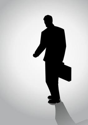 Silhouette Of Businessman Walking