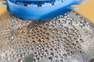 Condensation of water in a plastic bottle exposed to the sun, Madrid Spain photo