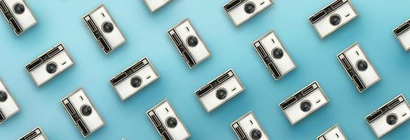 Vintage camera pattern on blue background. photo