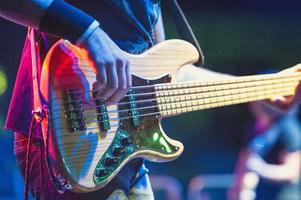 5-string bass player during a live show photo