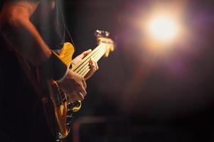 5-string bass player during a live show photo