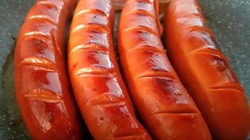 Close up view of four sausages photo