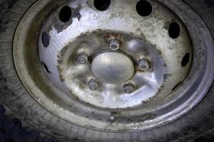 Muddy car wheels photo