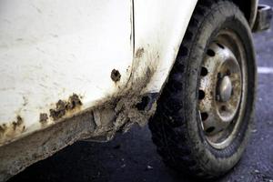 Muddy car wheels photo