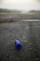 Plastic bottle on ground photo