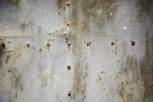 Rust texture on metal wall photo