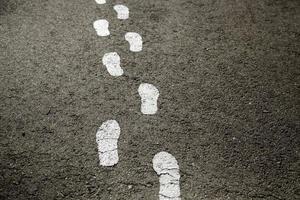 Footprints on street photo