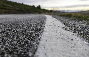 Salt on icy road photo