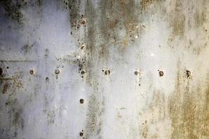 Rust texture on metal wall photo