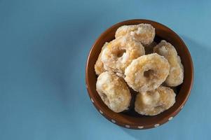 Indian Traditional Sweet Food Balushahi on a blue background photo