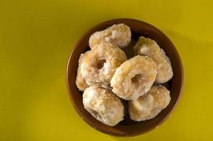 Indian Traditional Sweet Food Balushahi on a yellow background photo