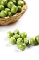 Fresh Green Peas in basket on white background