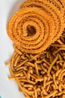 Indian Snack  Besan Gram flour Sev and chakli, chakali or Murukku. photo