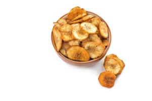 Banana chips on a white background photo