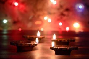 Clay diya lamps lit during Diwali Celebration. Greetings Card Design Indian Hindu Light Festival called Diwali