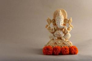 Hindu God Ganesha. Ganesha Idol on background photo