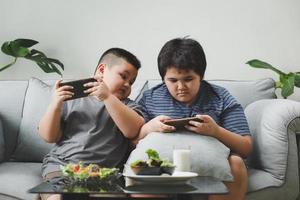 Brother and sister playing games photo