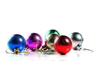 Christmas balls with ornaments on white background. photo