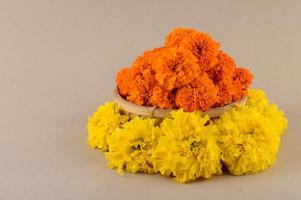 Marigold, Zendu Flowers flowers in a bamboo basket. photo