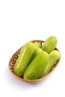 Fresh cucumbers isolated on white background photo