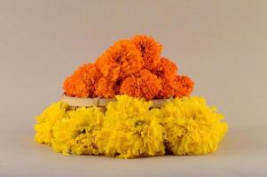 Marigold, Zendu flowers in a bamboo basket. photo