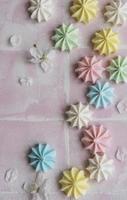 Small colorful meringues photo