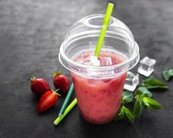 Refreshing summer drink with strawberry photo
