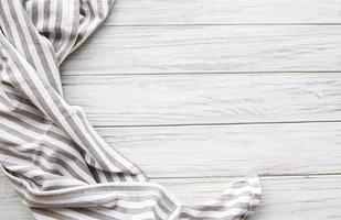 Kitchen napkin on the wooden table photo