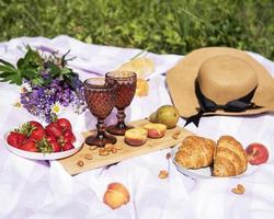 Romantic picnic scene on summer day photo