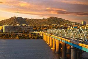 Seoul tower and Dongjak bridge over Han river in Seoul, South Korea photo