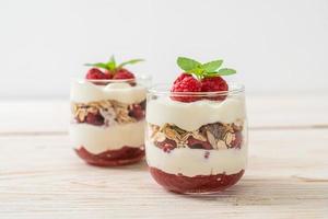 Fresh raspberry and yogurt with granola - Healthy food style