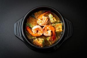 Sour soup made of Tamarind Paste with Shrimps and Vegetable Omelet photo