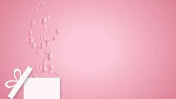 cuori volanti di San Valentino. elementi volanti di carta su sfondo rosa. video