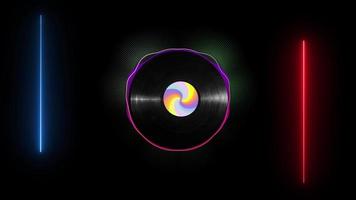 Vinyl disk with a colorful sticker rotating and visual audio lines moving to the beat of music on black background. video