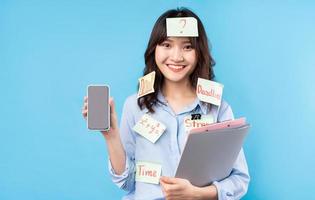 Portrait of college student girl on background photo