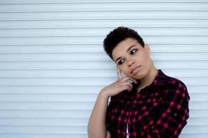 Serious and beautiful african american woman with short hair, lifestyle photo