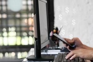 Businessman hand working on laptop computer and network and data connection , work from home concept, marketing plan concept photo
