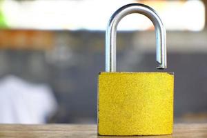 Padlock on table background and business security concept, protecting data personal information