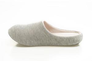 Grey slipper isolated on white background photo