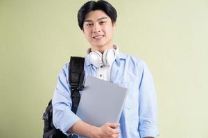 Handsome male Asian student photo