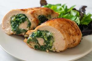 Chicken breast stuffed with cheese and spinach photo