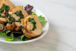 Chicken breast stuffed with cheese and spinach photo